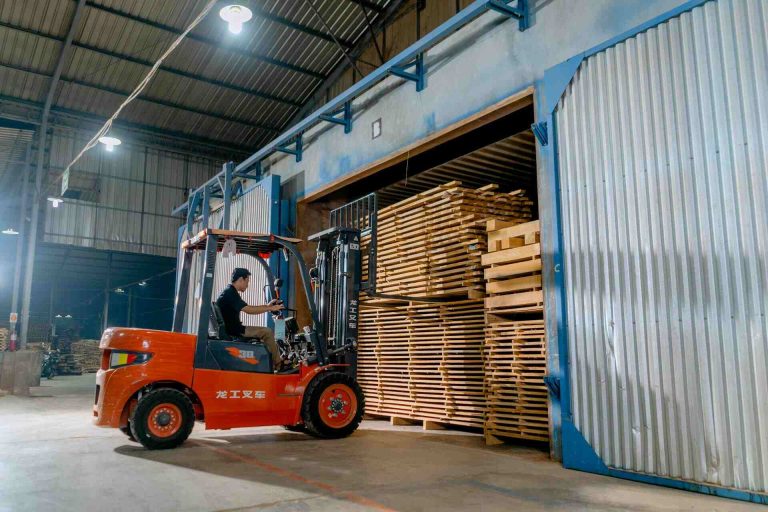 A Man Driving a Forklift