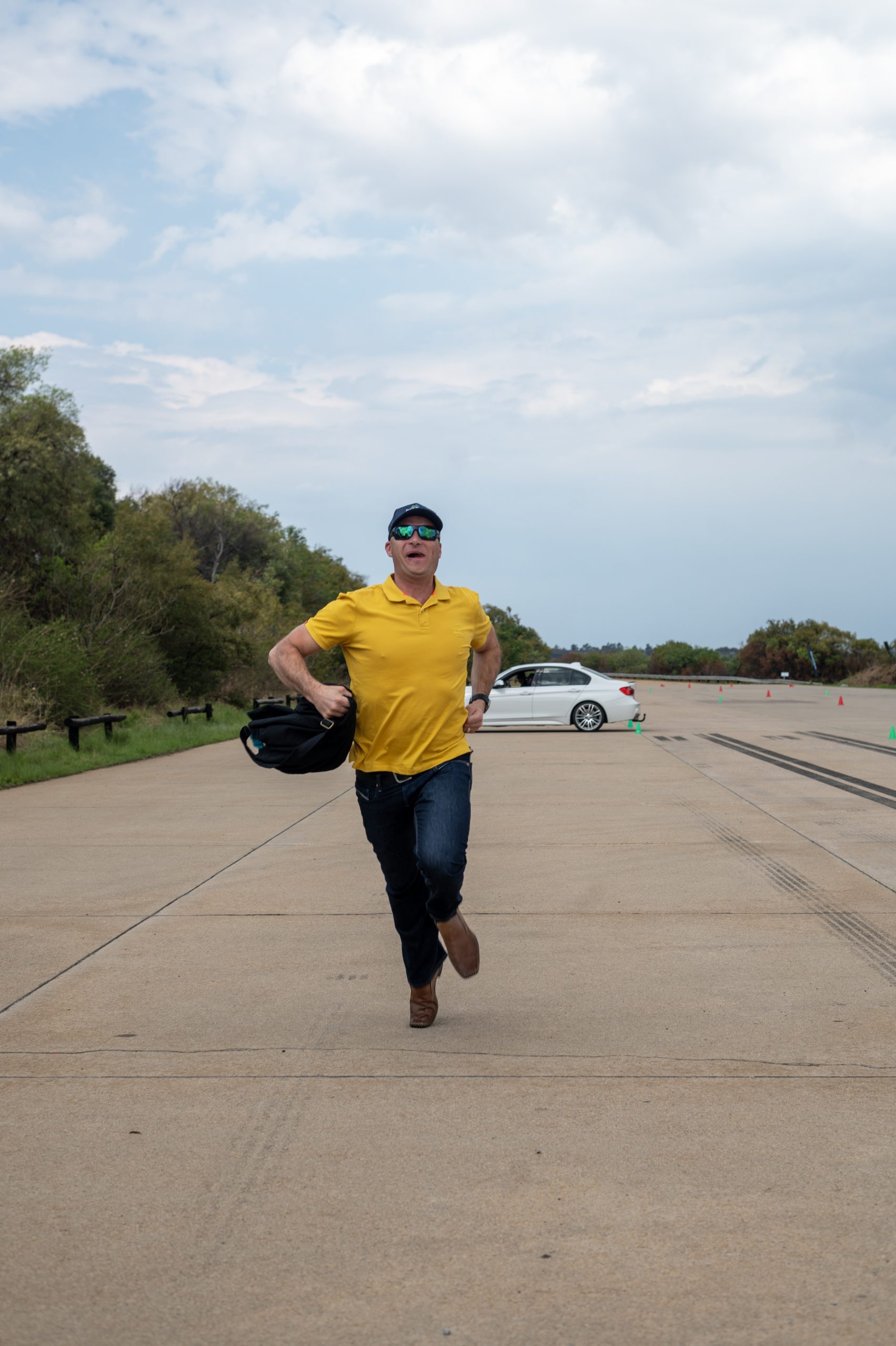 a Braintree employee running down a road - 14