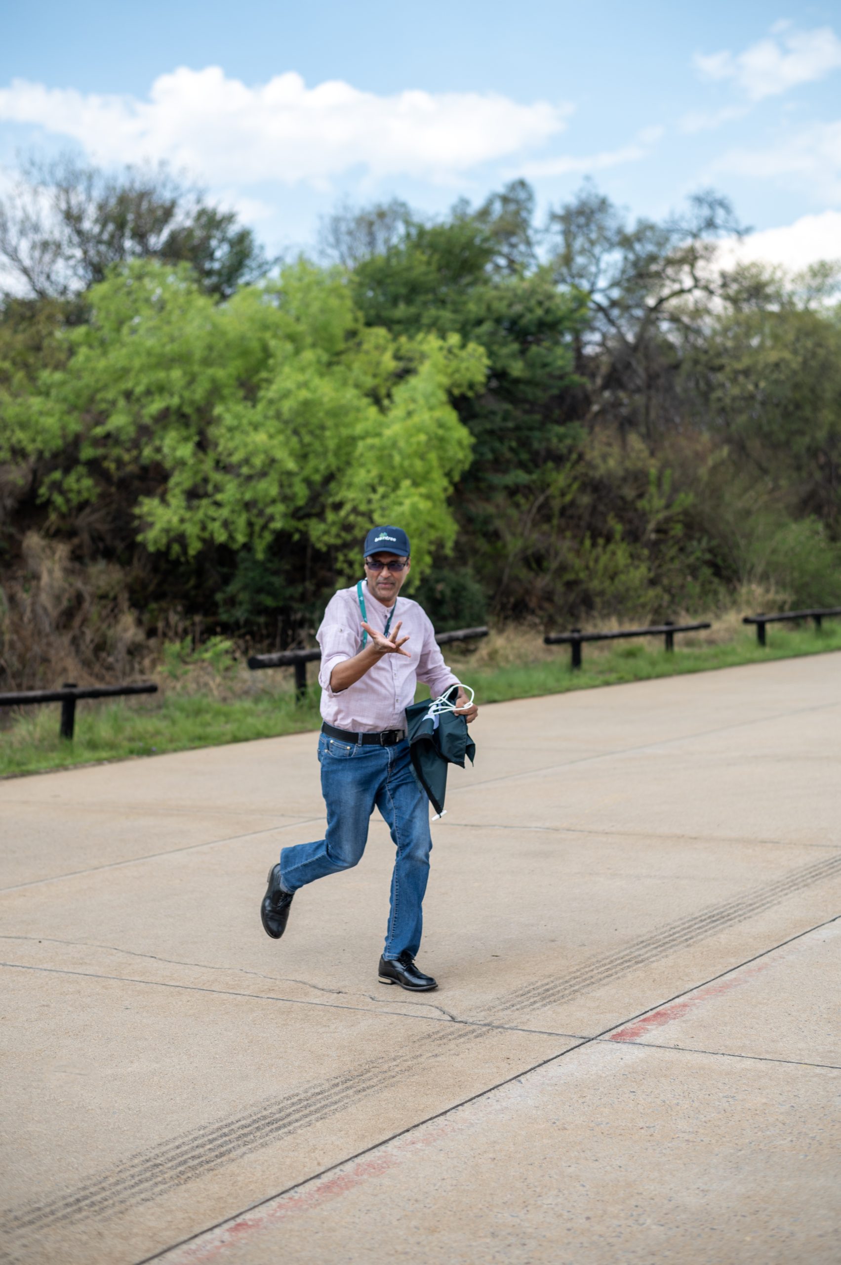 a Braintree employee running down a road - 13