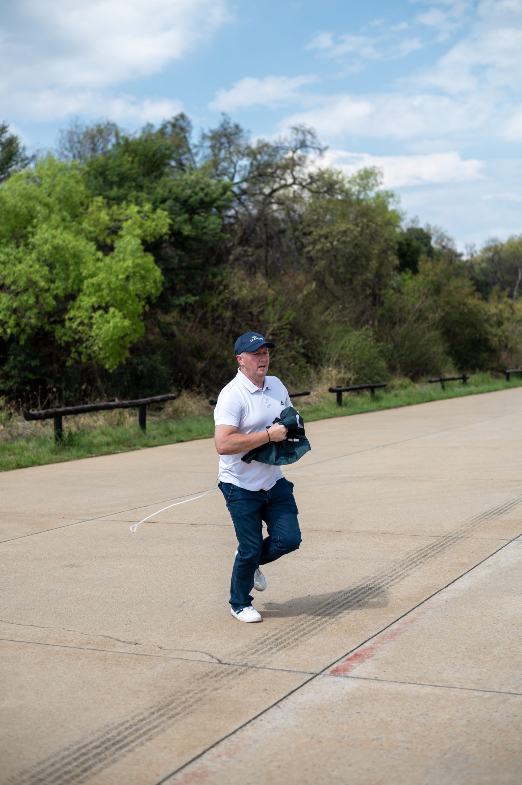 a Braintree employee running down a road - 11