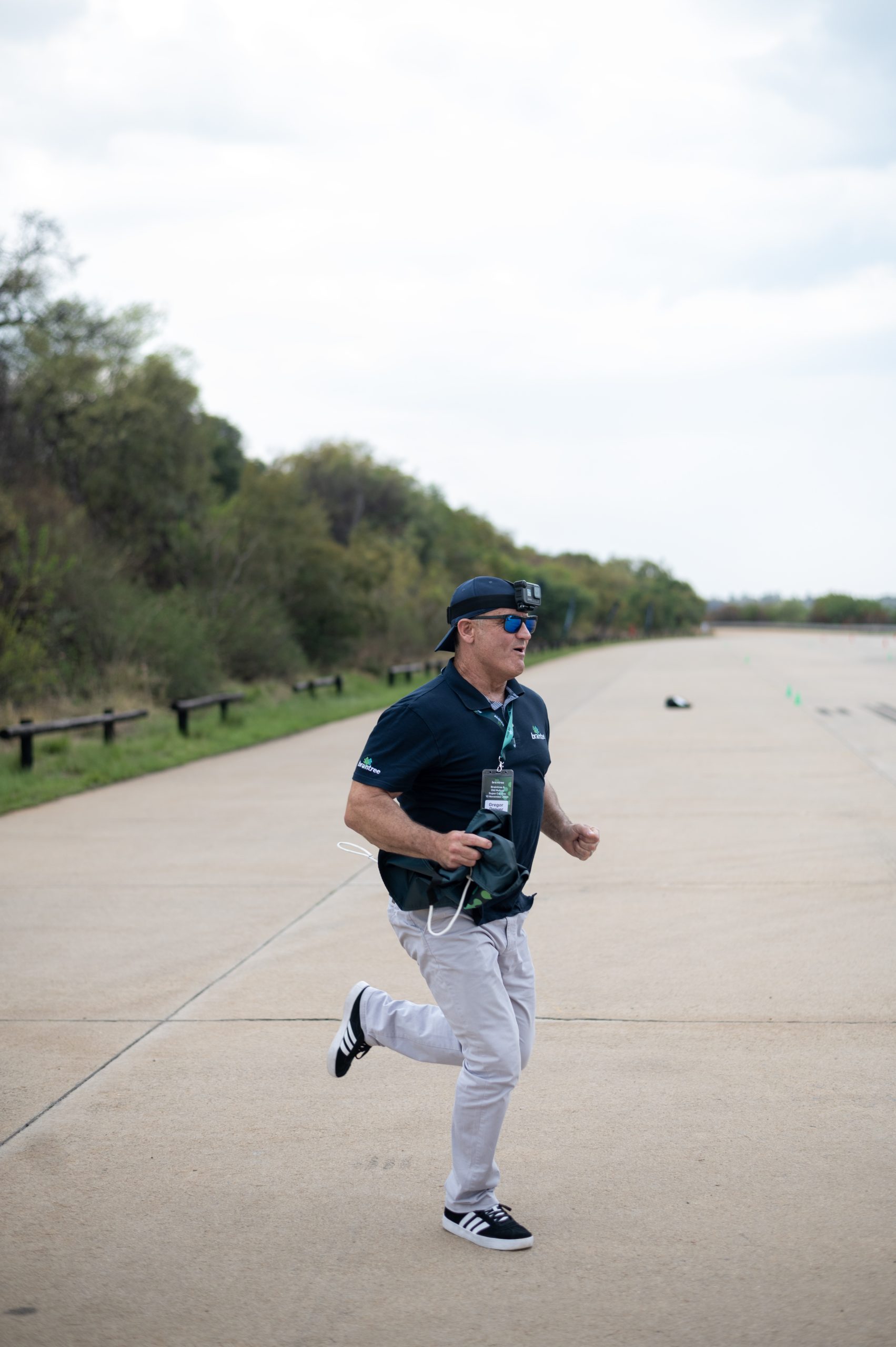 a Braintree employee running down a road - 2