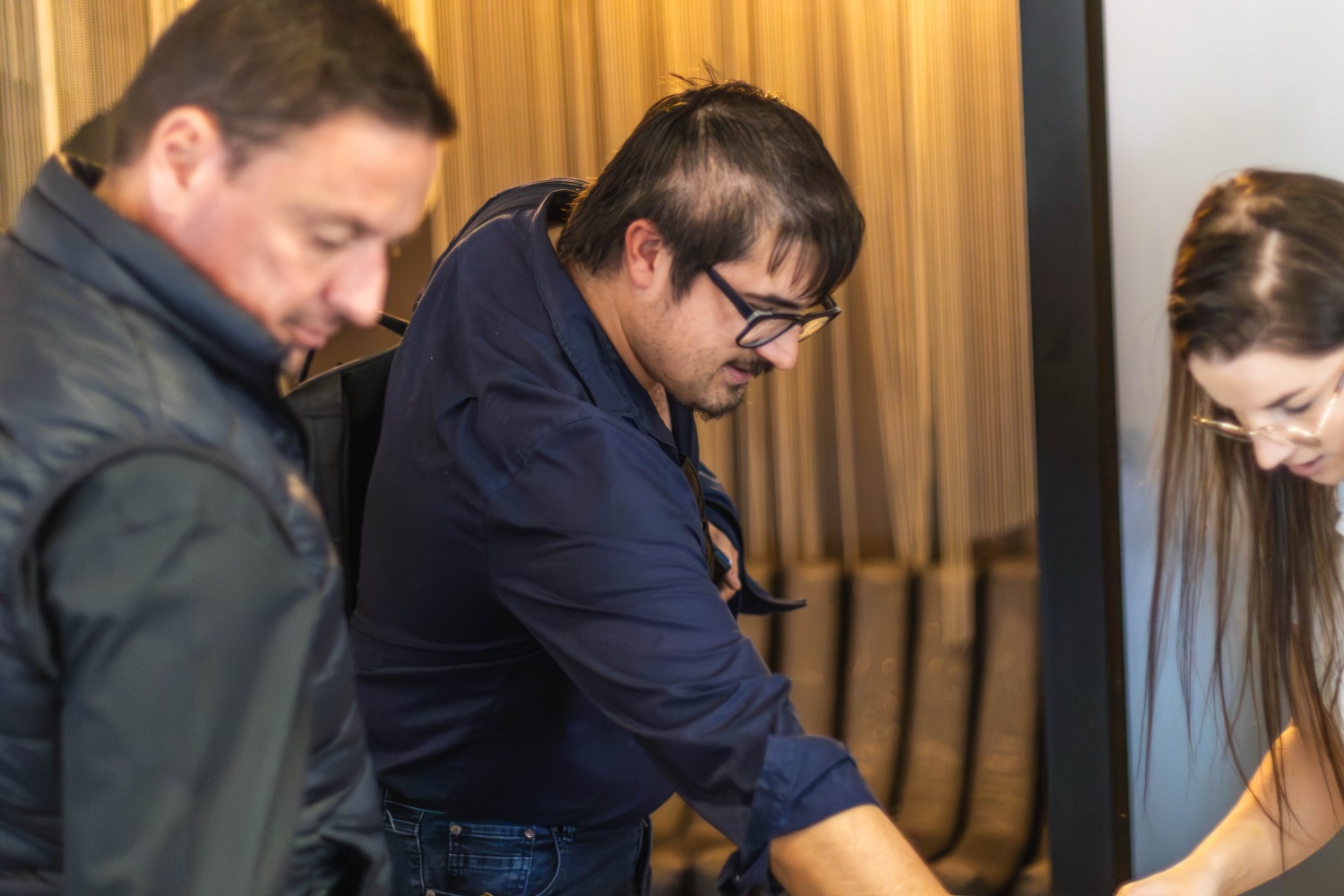 A guest being welcomed and checked in at the desk