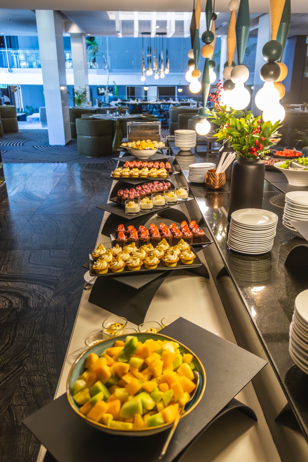 Colourful canapes and fruit on the catering table
