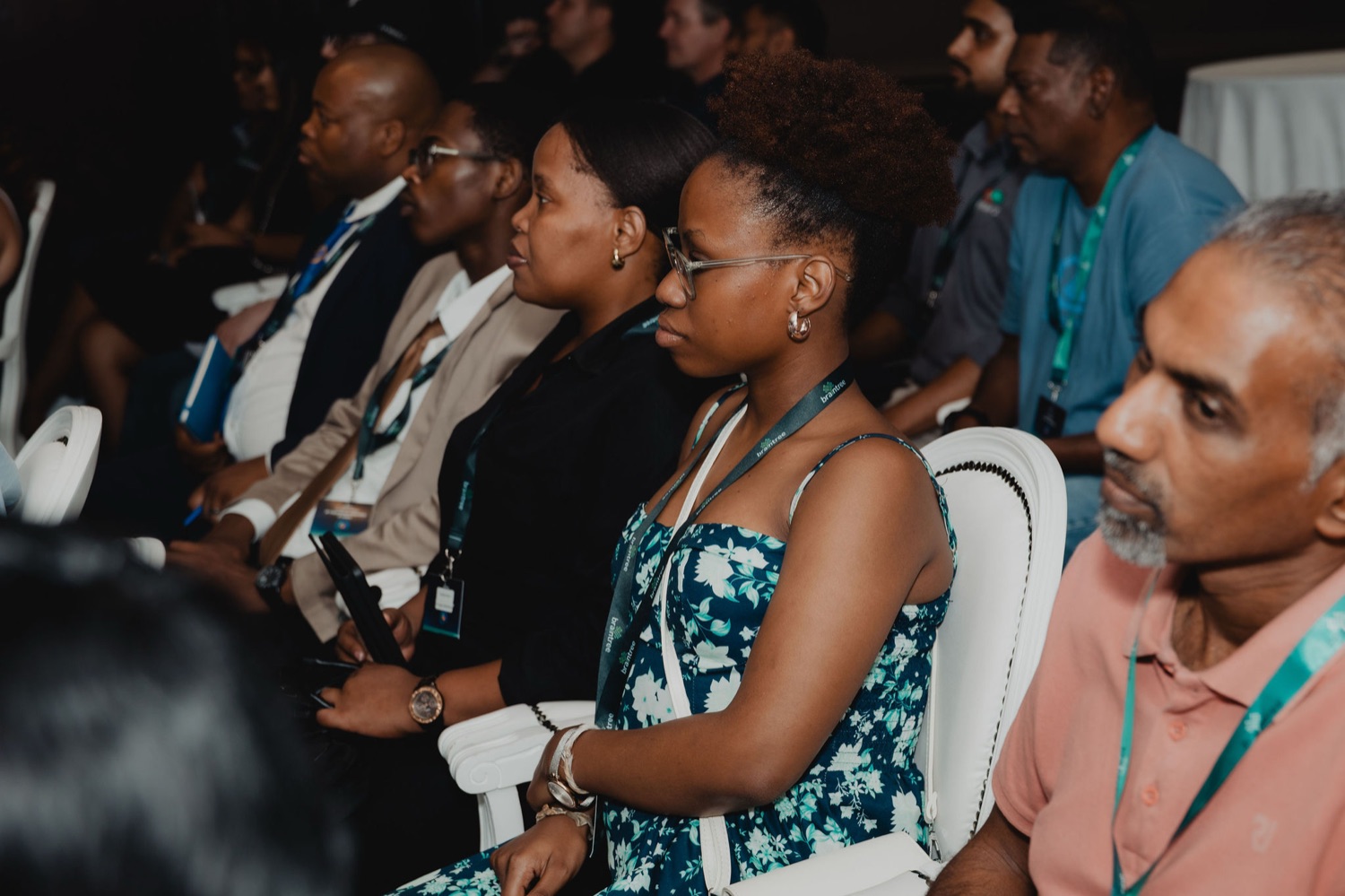 Attentive guests seated during the session