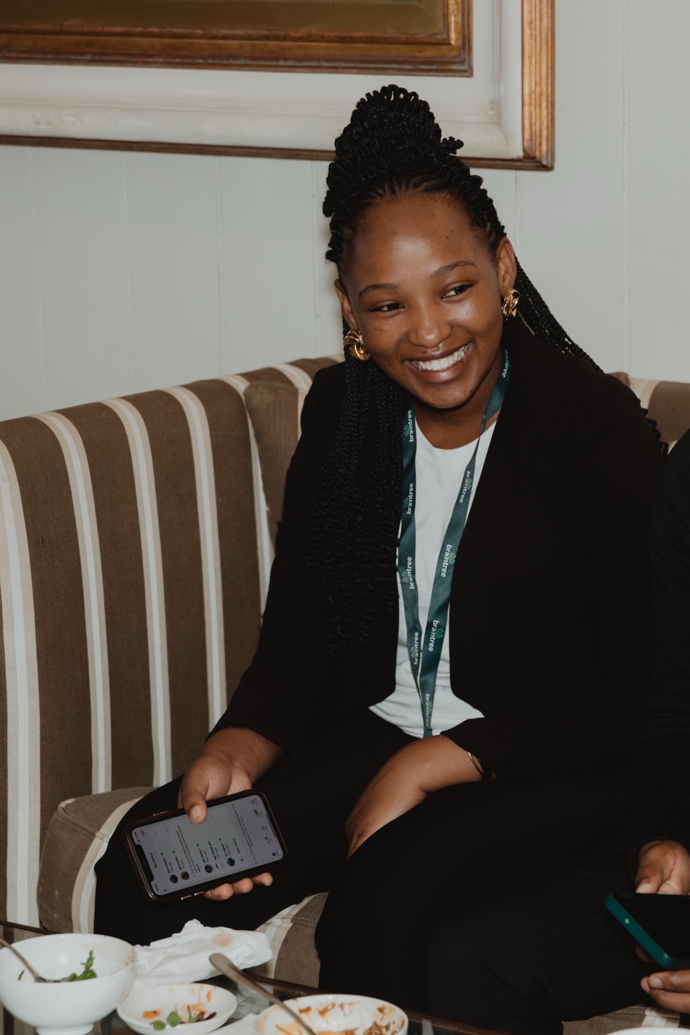 A guest smiling warmly during the reception