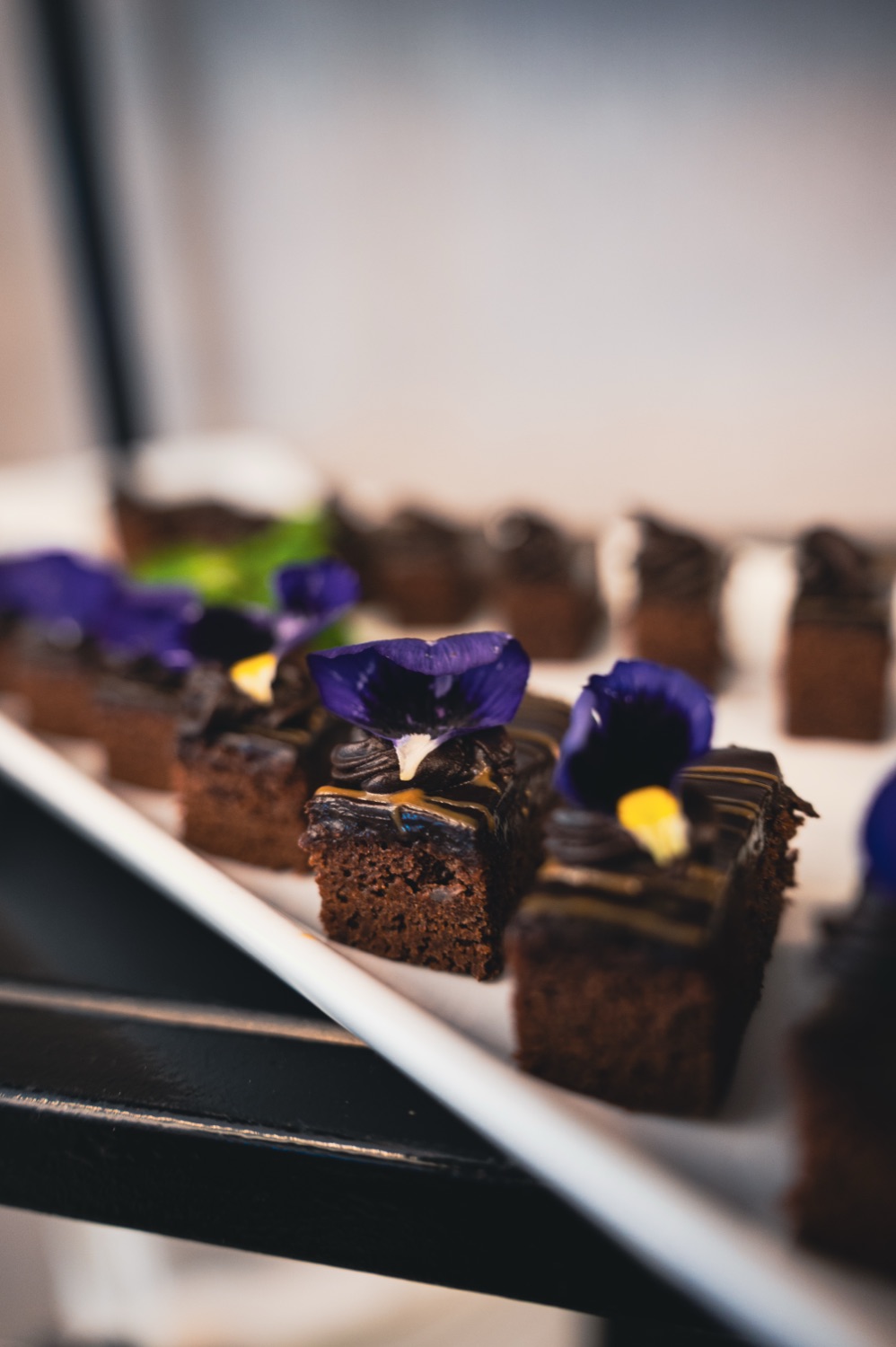 Individual desserts plated for guests during the break