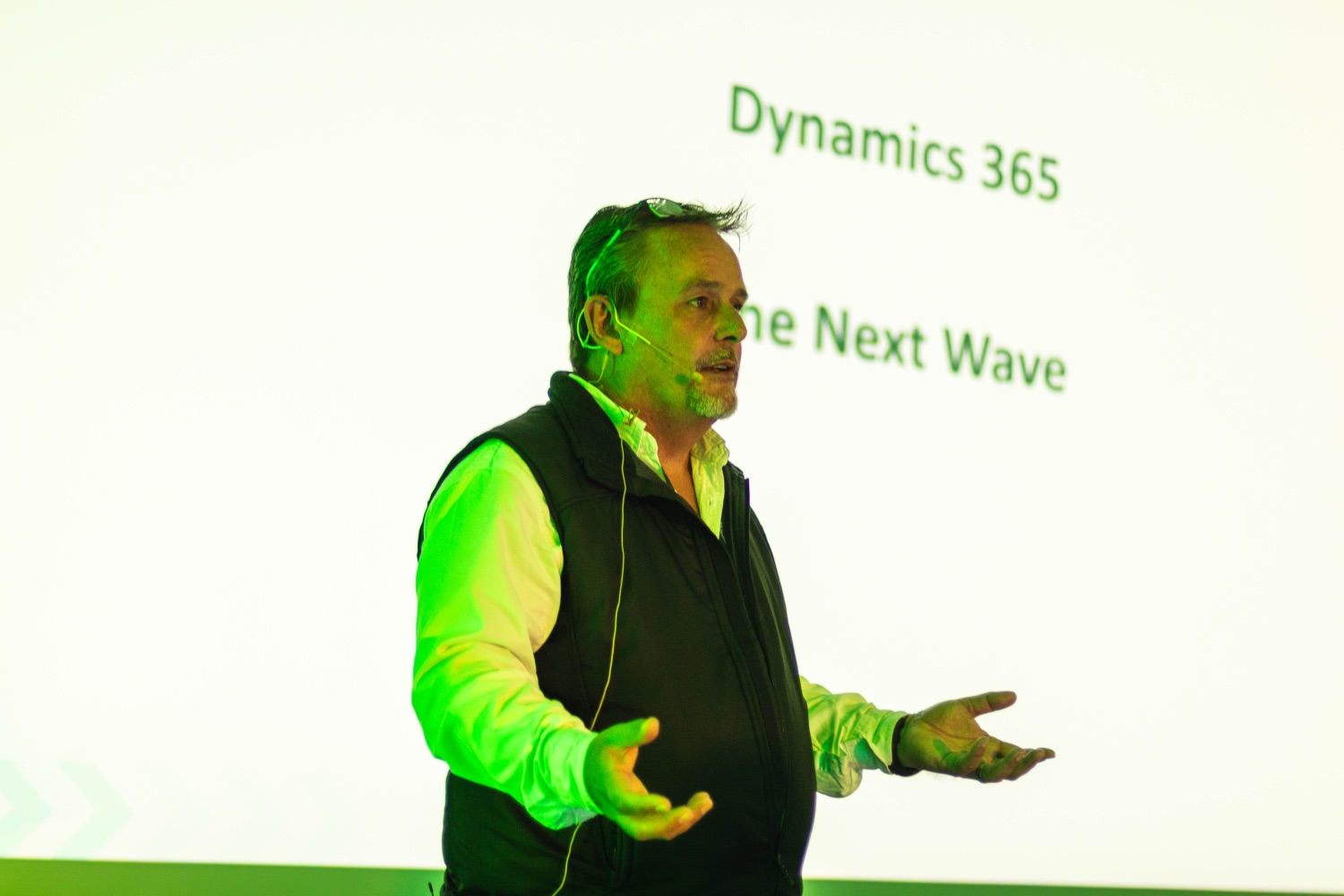 A speaker presenting the Dynamics 365 Next Wave keynote
